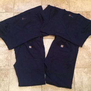 Two sets of Carhartt navy scrubs